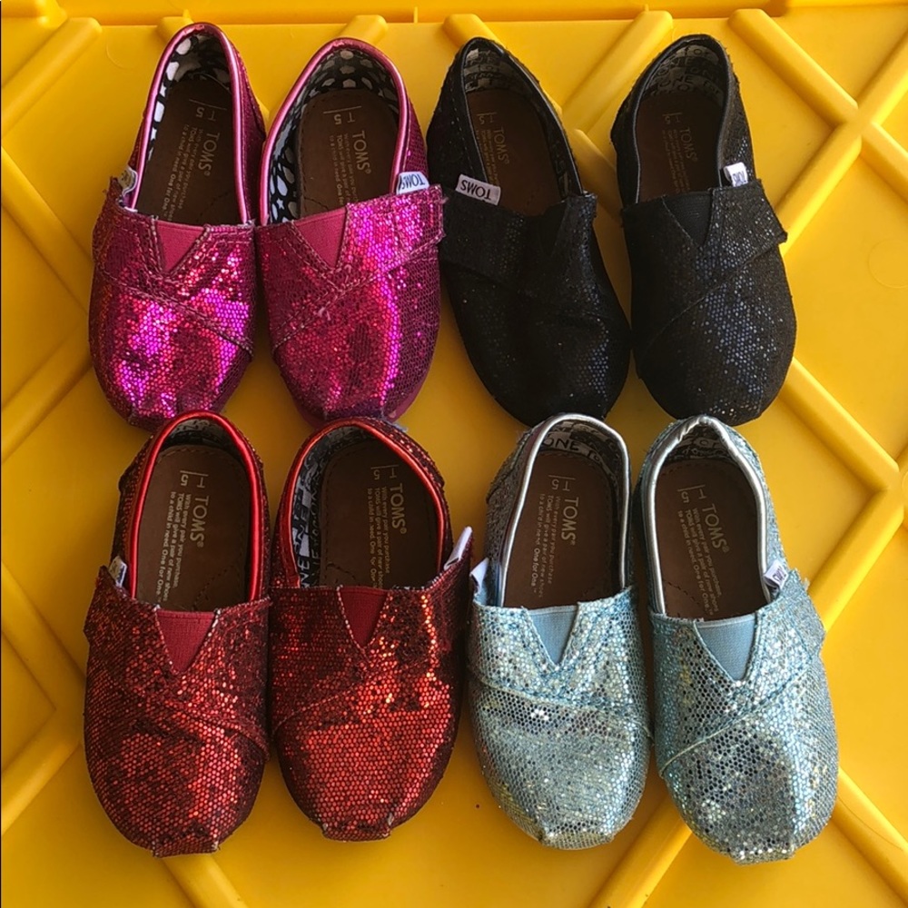 Gently used. Girls glitter TOMS Size T5